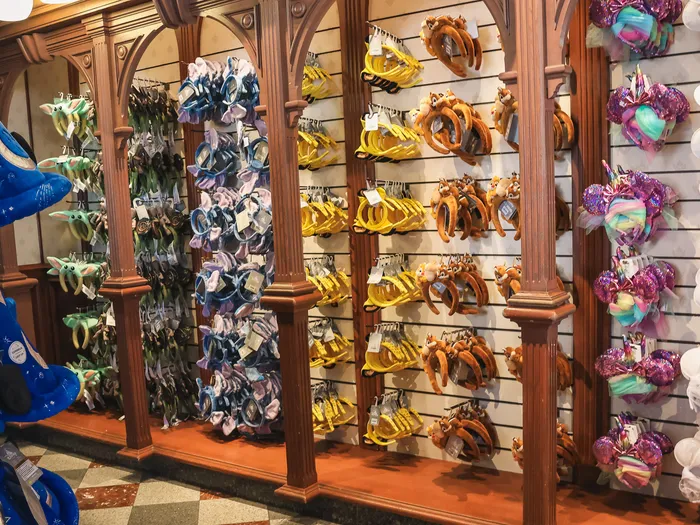 Wall of Disney ear headbands and Fantasia sorcerer hats in the Plaza West Boutique