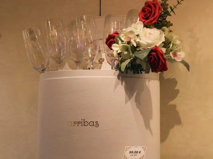 Gift box of engraved champagne flutes and roses at Harrington’s at Disneyland Paris.