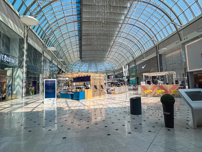 Gallery of the Val d’Europe shopping centre under its vast glass roof, near Disneyland Paris