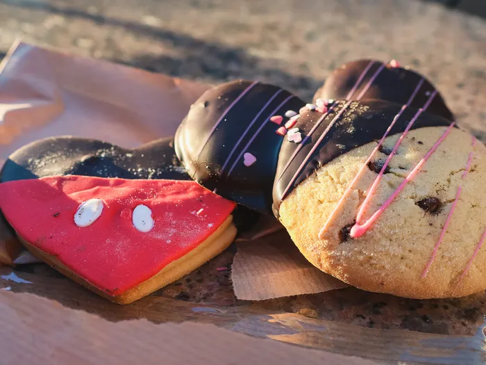 Biscuits and shortbread, including a red-iced Mickey shortbread, from La Confiserie des Trois Fées at Disneyland Paris.