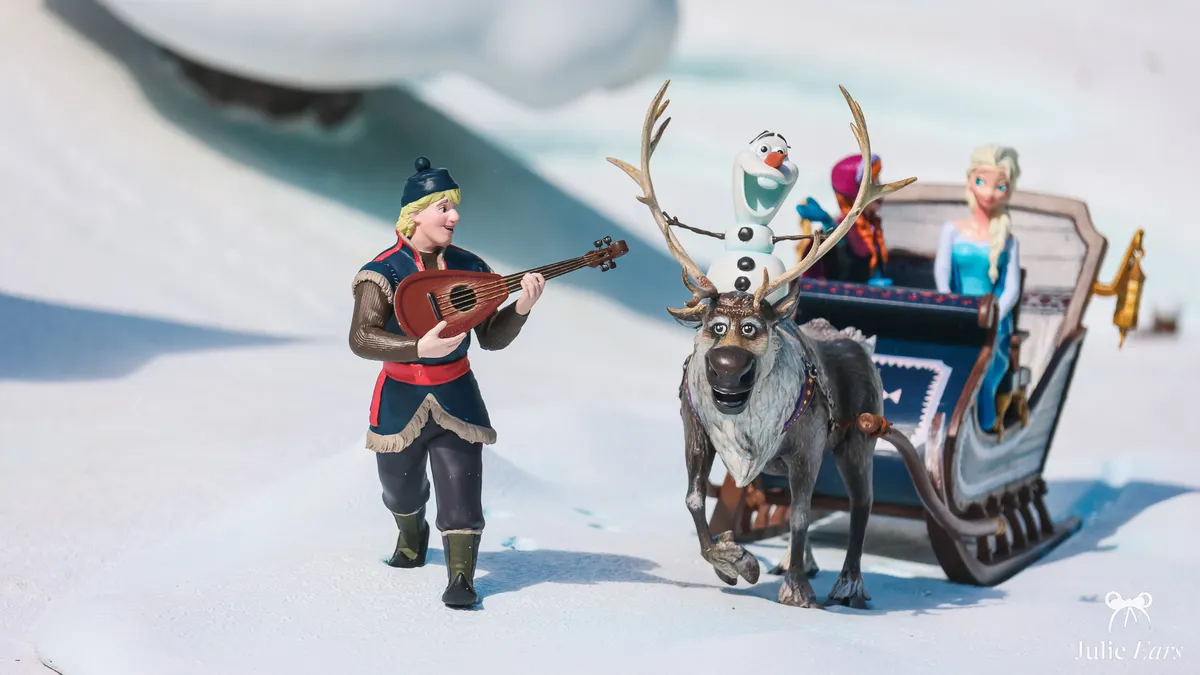 Frozen figurines in Le Pays des Contes de Fées, Disneyland Park: Kristoff with his lute, Sven pulling Anna and Elsa’s sleigh, Olaf in Sven’s antlers