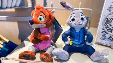 Judy Hopps and Nick Wilde shoulder plushes, from Zootropolis, on a shop shelf at Disneyland Paris.
