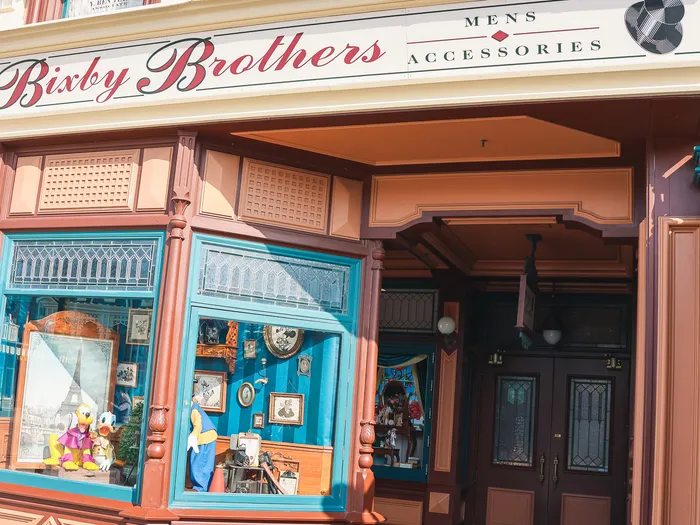 Victorian shop window filled with Disney figurines along Main Street U.S.A. at Disneyland Paris