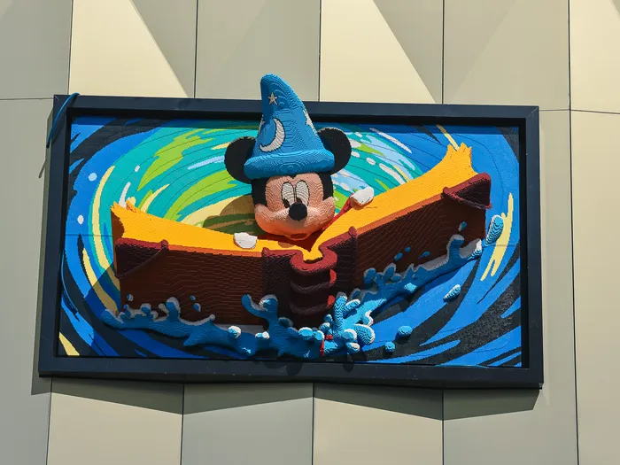 LEGO mosaic of Sorcerer’s Apprentice Mickey in a rowing boat on the facade of The LEGO Store.