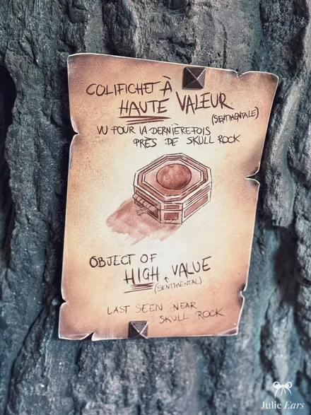 Adventure Isle lost items scroll at Disneyland Paris: a hinged octagonal case, a "trinket of great (sentimental) value", last seen near Skull Rock