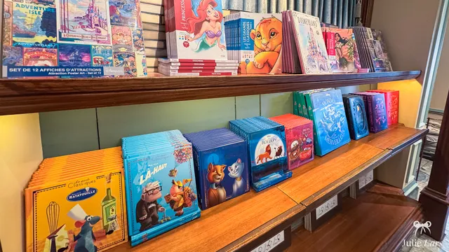 Shelves of Disney children’s books in a shop at Disneyland Paris, with great classics such as Ratatouille, Up and Frozen.