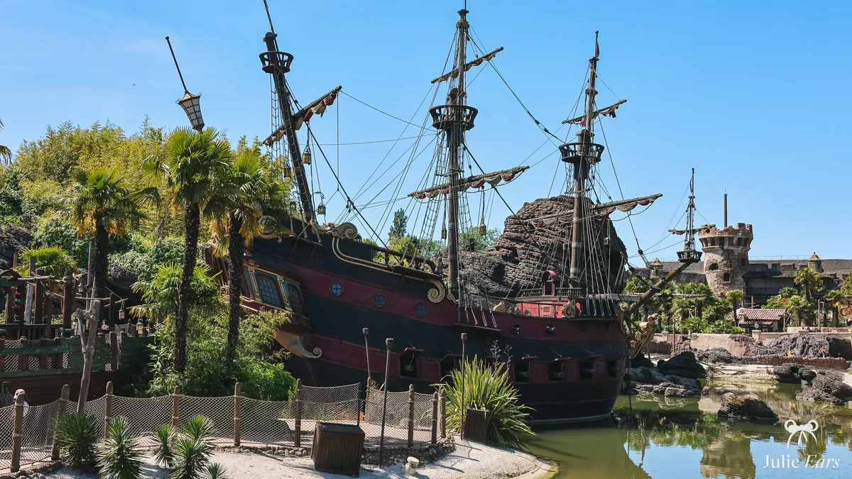 Pirate Galleon, Captain Hook’s ship, by the Adventureland lagoon in front of Skull Rock at Disneyland Paris, with almost no visitors