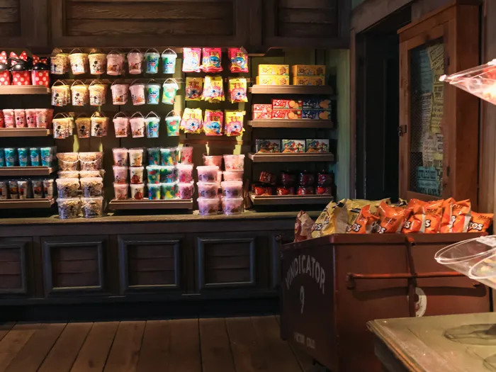 Wall of sweets, Mickey tins and bags of popcorn at the Thunder Mesa Mercantile Building